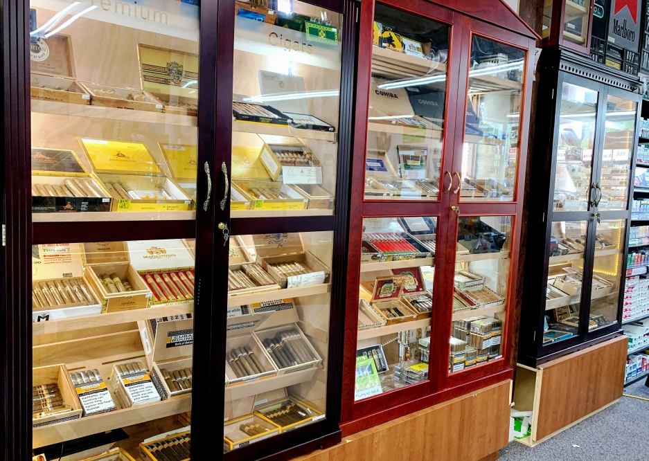 a display case with different types of cigars